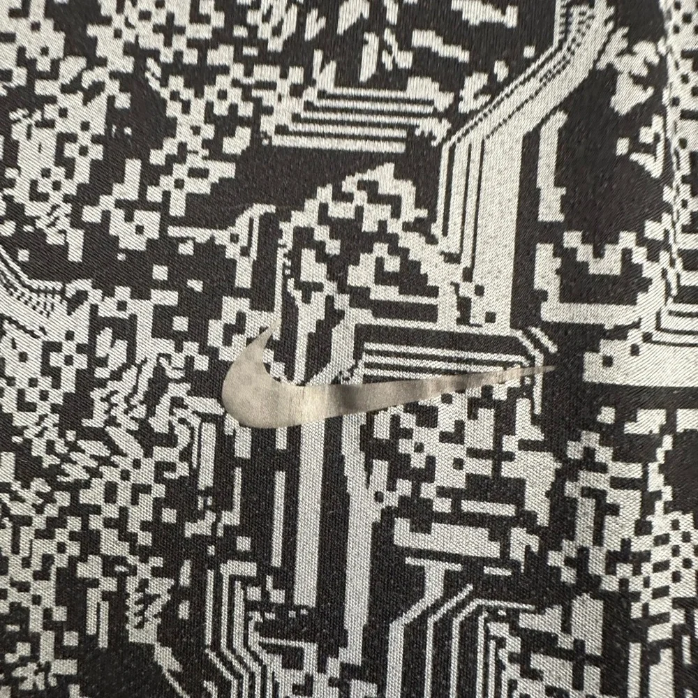 Nike Black and Gray Graphic Tee